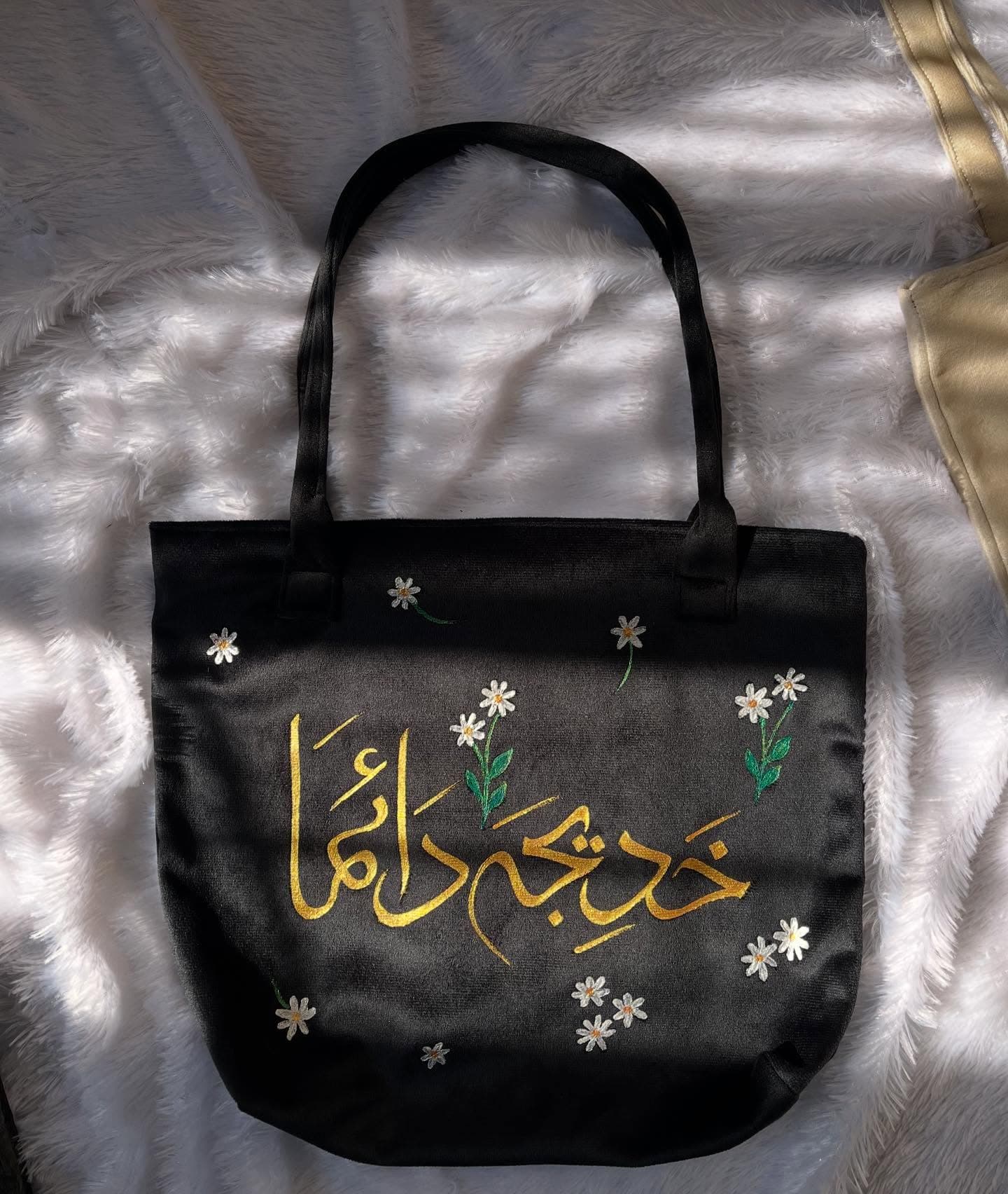 Black satin tote bag with white daisies